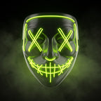 X-eye LED mask glowing neon green in smoke