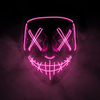 X-eye LED mask glowing pink in smoke